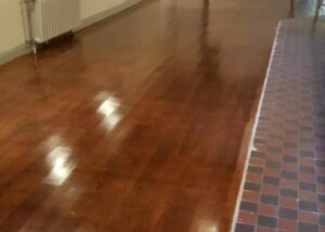 Protective coating applied to wooden floor.